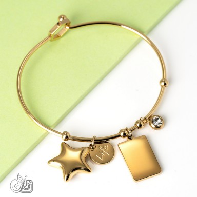 Bracciale rigido "star" in acciaio inox placcato oro